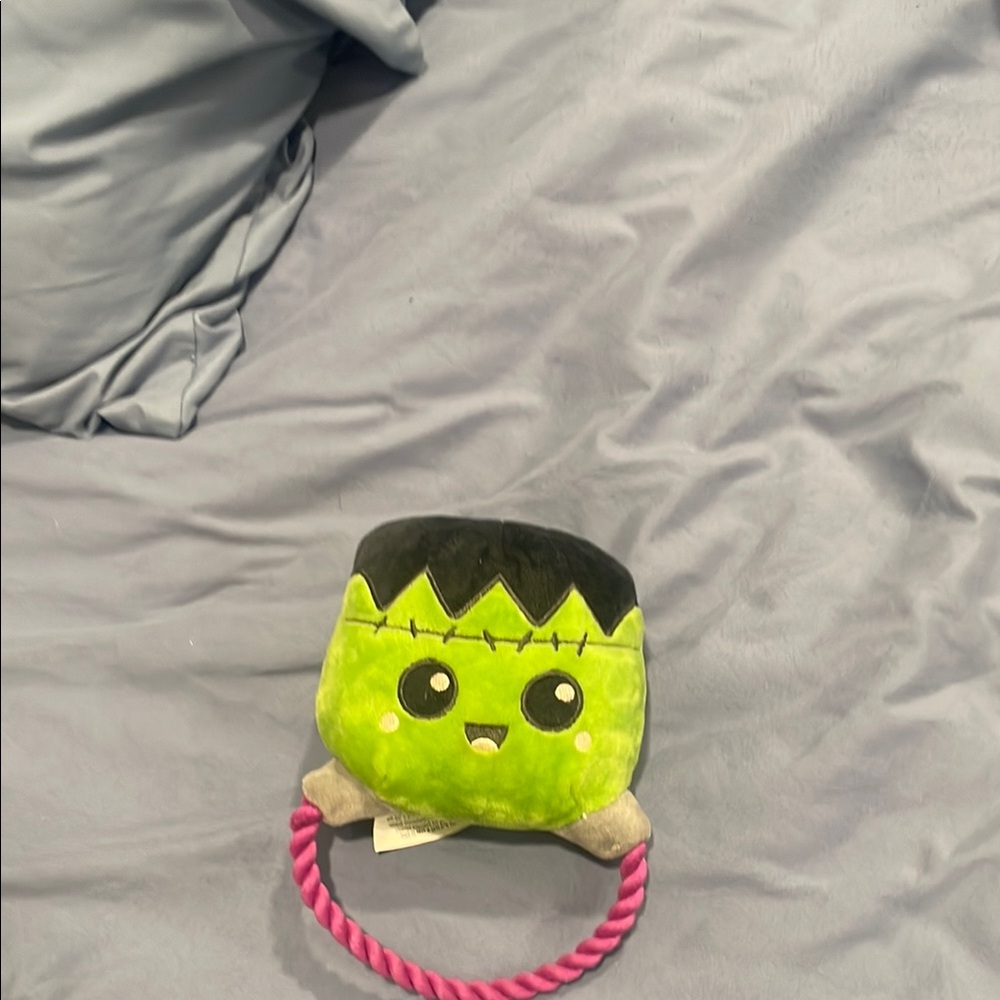 Green and Black Plush Monster Toy